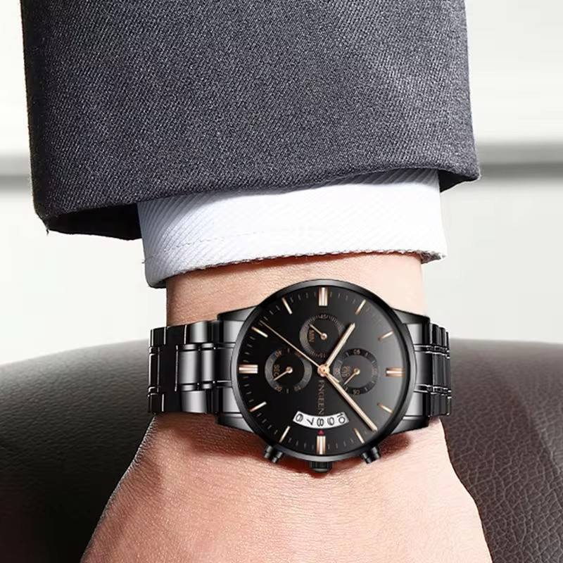 Elegant black chronograph watch with gold accents, stainless steel band, and precision timekeeping craftsmanship